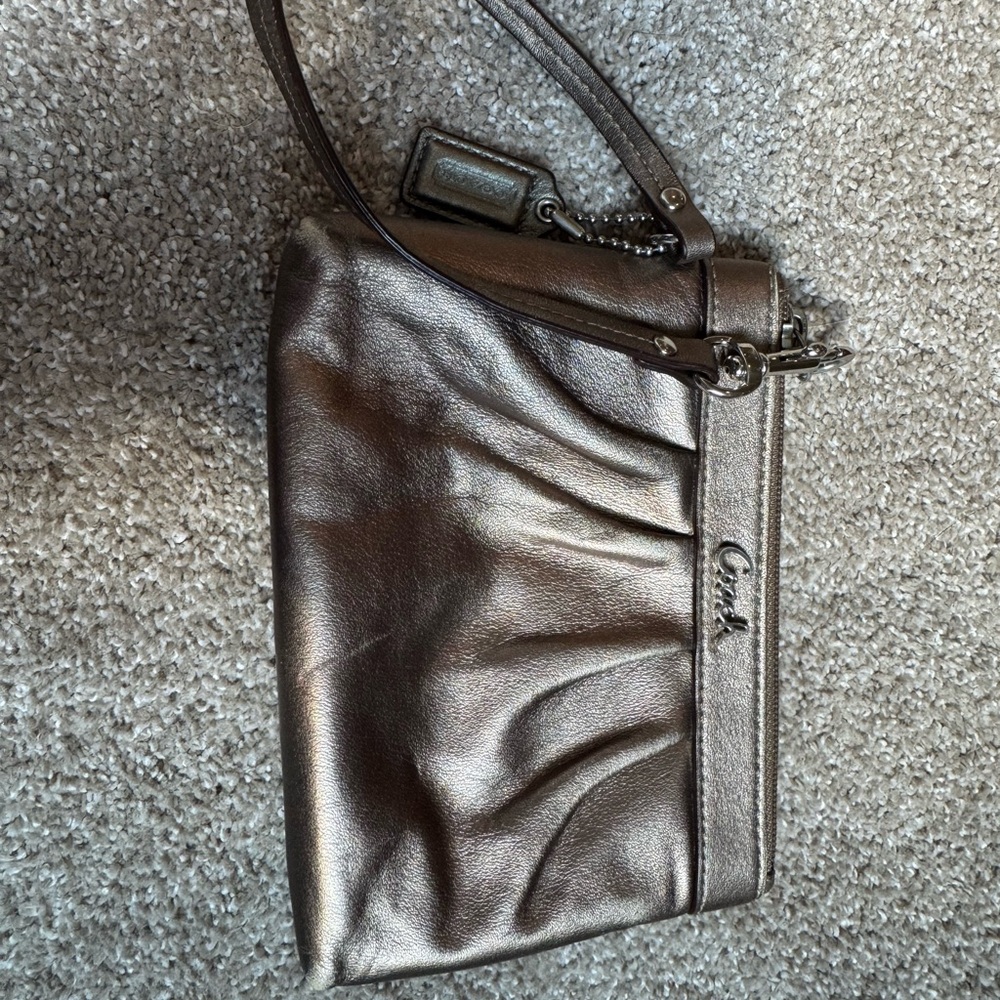 Coach Shimmering Bronze Wristlet